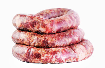 fresh raw ground meat sausages isolated on white background.