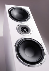 Closeup of white audio speaker