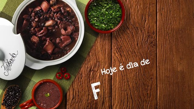 Stop motion Brazilian Feijoada Food. Written "Today is Feijoada's Day" in Portuguese. Top view with copy space. heart pot pulsating