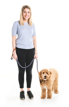 Woman With His Golden Labradoodle Dog Isolated On White Background