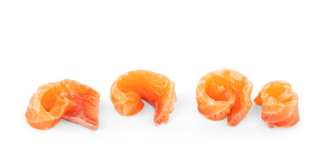 Set of juicy slices of salmon isolated on white background