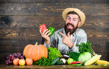 Own harvest. harvest festival. bearded mature farmer. organic and natural food. happy halloween....