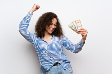 Dominican woman with striped shirt taking a lot of money