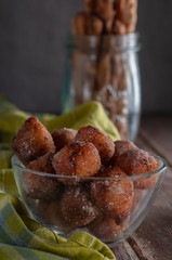 cheese balls with bread sticks and wine. on a wooden table	