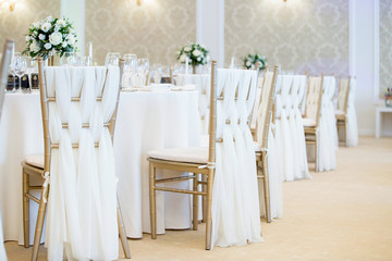 Close up detail of chairs decorations wedding venue 