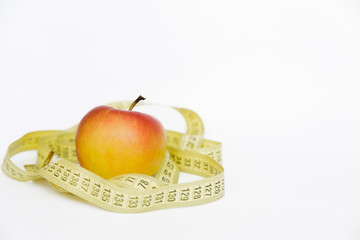 apple a healthy lifestyle for a beautiful body to lose weight and have a sports figure to cultivate the right eating habits and diet on a white background