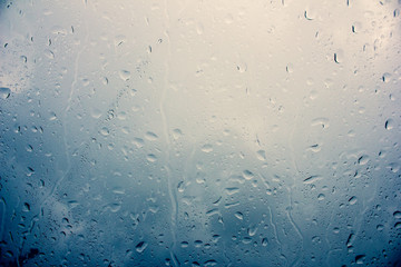 background of water drops on a surface with vintage setting.