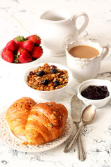 breakfast with coffee and croissant