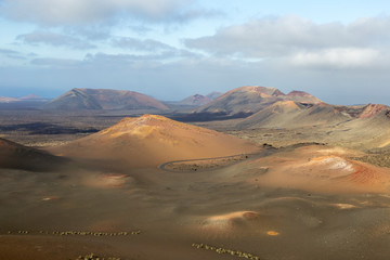 Fototapeta na wymiar Volcanic landscape at Timanfaya national park, at Lanzarote island. Canary islands. Spain.