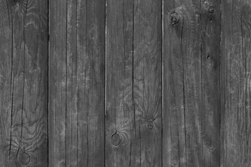 black and white wood background: detail of fence made of wooden planks