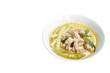 spicy boiled chicken with coconut shoot in curry on bowl