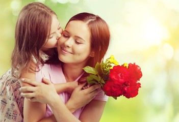 Happy Mother and daughter hugging