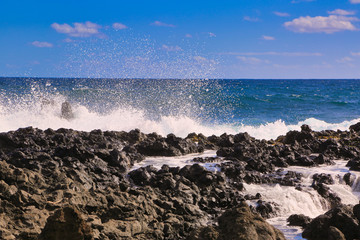 Waves crashing against the rocks