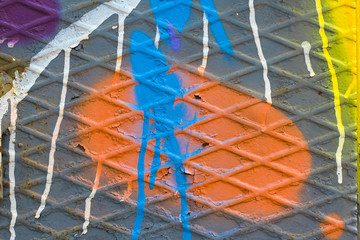 Fantastic abstraction Multicolored paints cover a metal surface 
