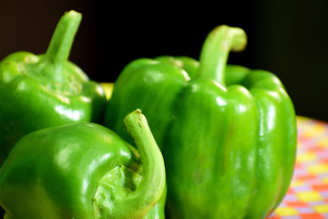 Beautiful green capsicum on a table
