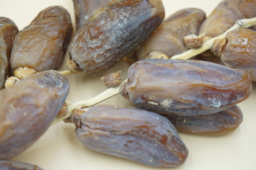 closeup sweet dried date palm fruits or kurma, ramadan (ramazan) food