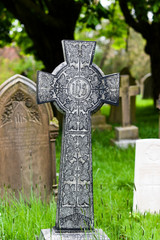 Old celtic cross at a cemetery in England.
