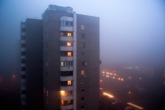 Building from soviet union time in morning evning fog