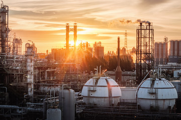 Gas storage sphere tanks in petrochemical industry or oil and gas refinery plant at evening,...