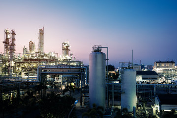 Fototapeta na wymiar Oil and gas refinery plant or petrochemical industry on sky sunset background, Factory of petroleum plant at evening, Manufacturing plant of petrochemical industrial