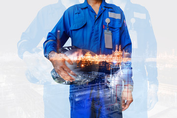 Technician stand hand holding safety helmet with blue uniform with double exposure oil and gas refinery industrial, Workers in petroleum industrial concept