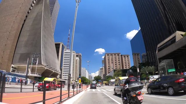 Time lapse in Paulista Avenue in Sao Paulo city.  Car in street of downtown Sao Paulo city