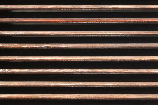 Worn and spaced wooden slats