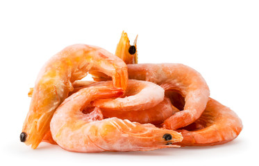 Heap of frozen shrimp close up, on a white. Isolated.