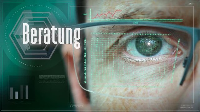 A close up of a businessman eye controlling a futuristic computer system with a Consultation "Beratung" German Business concept.
