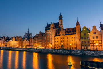 Fototapeta na wymiar Old town of Gdansk on bank of Motlawa River at dusk