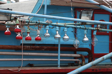 Hanging light bulb on the fishing boat.