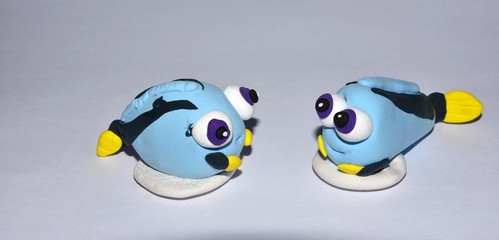 Two goggle eyed model fish looking at each other, Huddersfield Yorkshire England 09/05/2019