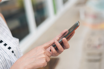 woman using smartphone