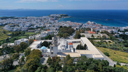 Aerial drone panoramic photo of iconic orthodox church of Lady of Tinos island or Church of Panagia Megalochari (Virgin Mary), Cyclades, Greece