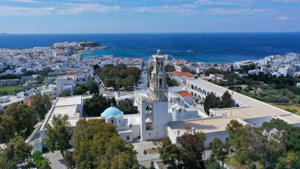 Fototapeta premium Aerial drone panoramic photo of iconic orthodox church of Lady of Tinos island or Church of Panagia Megalochari (Virgin Mary), Cyclades, Greece