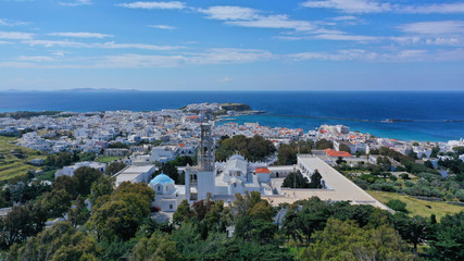 Fototapeta na wymiar Aerial drone panoramic photo of iconic orthodox church of Lady of Tinos island or Church of Panagia Megalochari (Virgin Mary), Cyclades, Greece