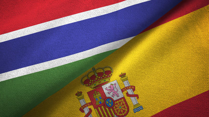 Gambia and Spain two flags textile cloth, fabric texture
