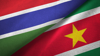 Gambia and Suriname two flags textile cloth, fabric texture