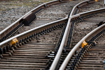 Obraz premium Multiple railway track switches , symbolic photo for decision, separation and leadership qualities. - Image
