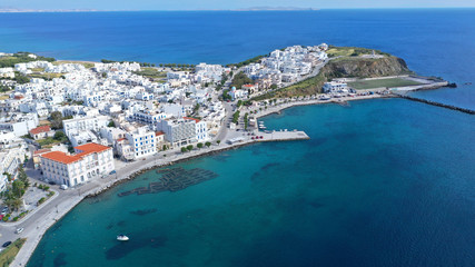 Aerial drone photo of iconic main town and port of Tinos island featuring monastery of Panagia...