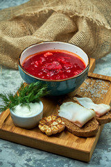 Red soup. Beautiful serving dishes. Restaurant menu