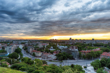 sunset over Plovdiv city, Bulgaria. Panoramic view from one of the hills - Nebet tepe with walls from ancient fortress. European capital of culture 2019.