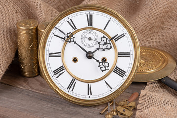 Antique clock face with accessories 