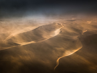 Aerial view with sand dunes at desert Namib in Namibia 