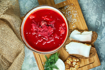 Red soup. Beautiful serving dishes. Restaurant menu