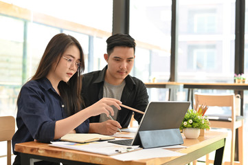Cropped shot meeting a startup business women and man working in co working space.
