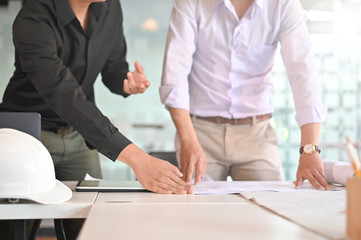 Cooperation Corporate Achievement Planning architecture meeting on workspace.