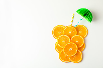 Composition with orange pieces and tubules on white background, top view and space for text. Citrus...