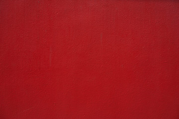 Vibrant red color cement wall