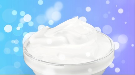 close up of a white beauty cream or yogurt on white background with clipping path